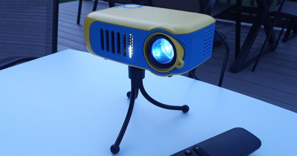 Portable Mini Projector w/ Tripod & Remote Just $35.99 Shipped on Amazon | Great for Travel or Camping