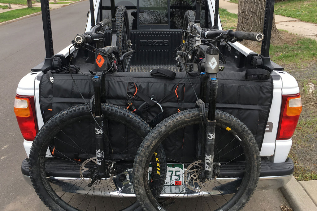 Bicycles, tools, beers, even a shower — RMU’s first tailgate pad packs more functions than mountain bikers will expect.