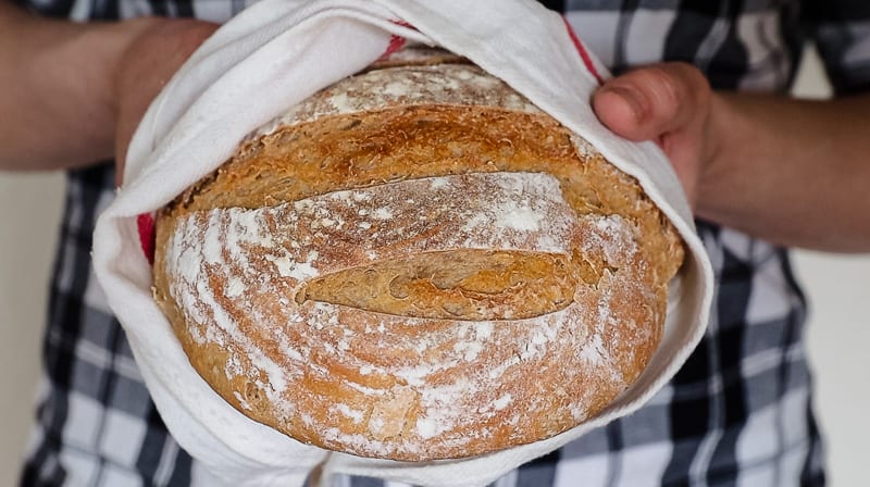 Learn how to make a simple homemade sourdough bread recipe in your very own kitchen